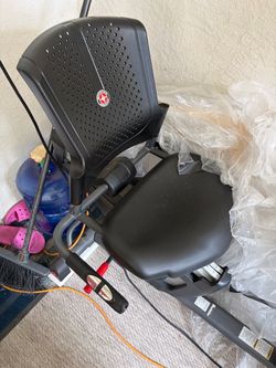 a black Schwinn 270 Recumbent Exercise Bike with a vented backrest and a covered flywheel housing
