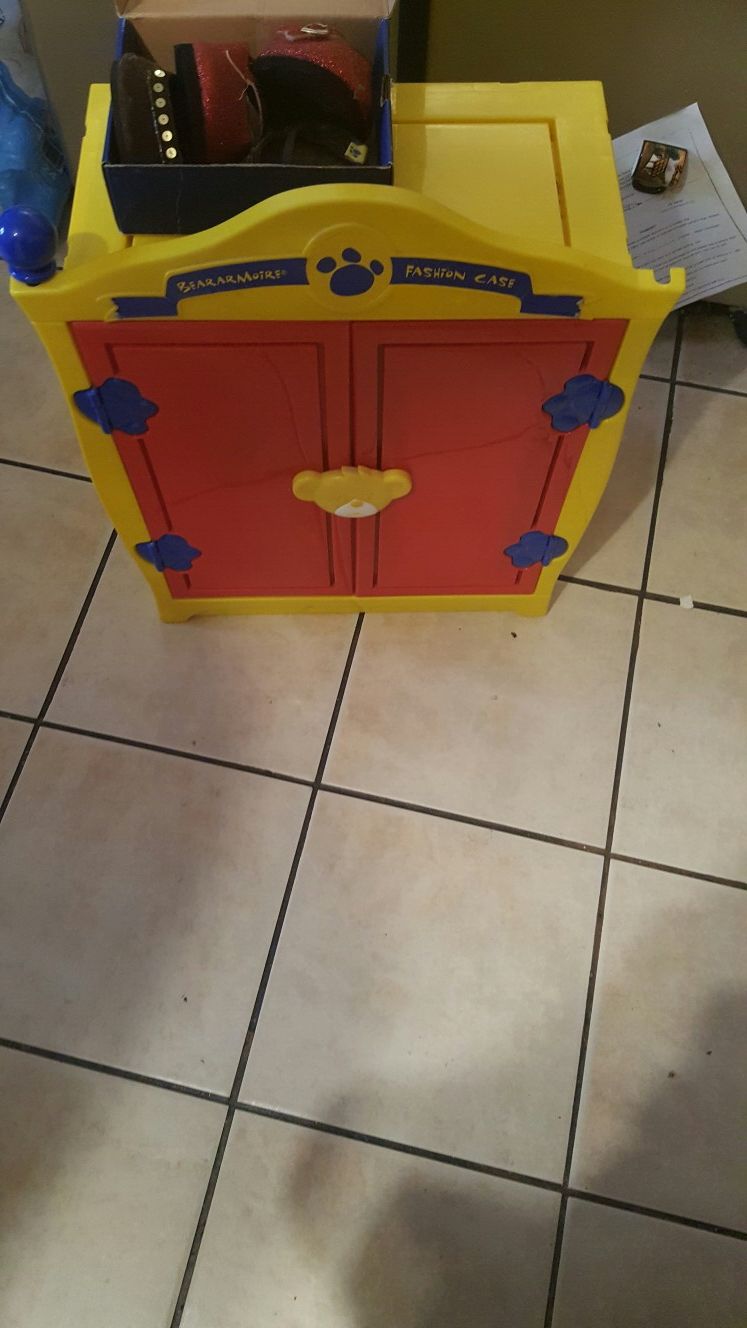 Built a bear closet with clothes and shoes included asst