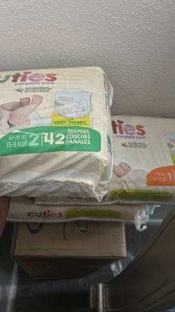 Never used Pack and play& size one and two diapers