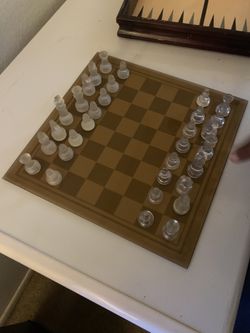 Chess set all glass and backgammon board, dominos and poker dice