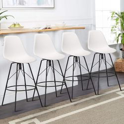 4 white plastic swivel bar stools with high backs and protective metal legs. Weight capacity 330 LBS.
