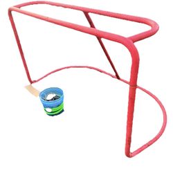 Hockey Goal With Bucket Of Pucks