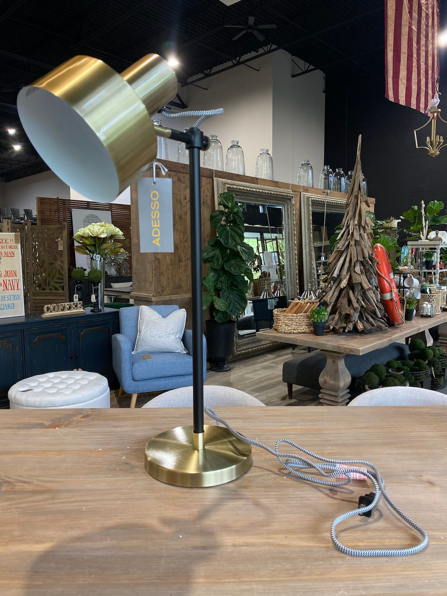 {ONE} Hayden Adjustable Metal Desk Lamp. Overall: 22.5'' H X 8'' W X 14'' D. Finish: gold/black. MSRP: $135. Our price: $72 + Sales tax