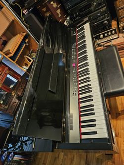Mini Grand piano  WILLIAMS
 $500