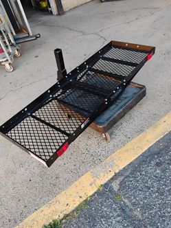 Haul-Master 5' folding cargo carrier designed for 2-inch hitch receivers.