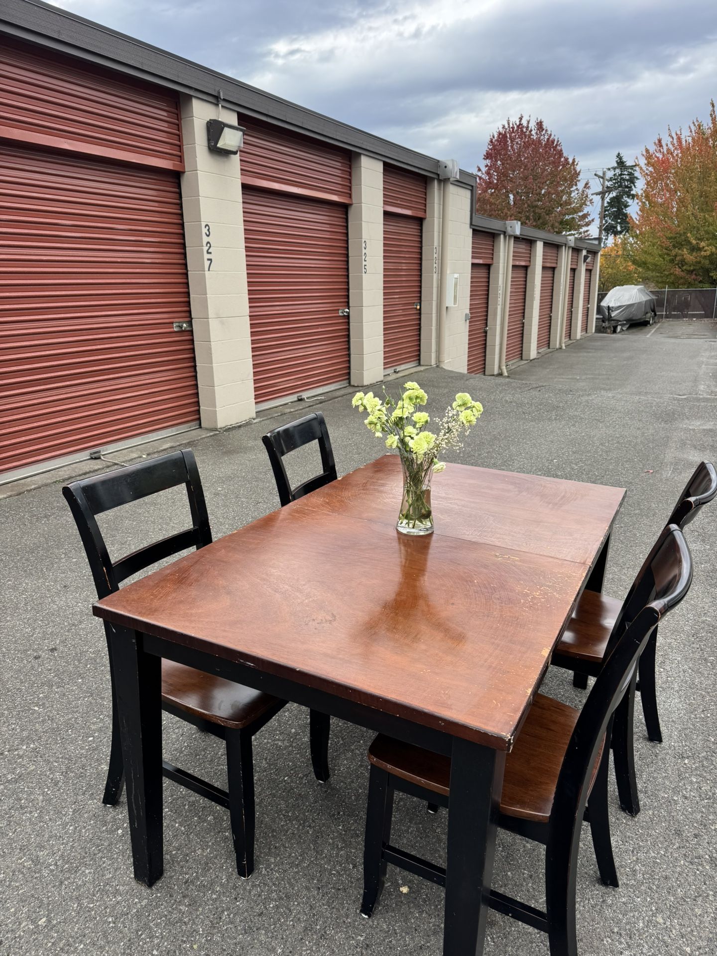 Wooden table and four chairs