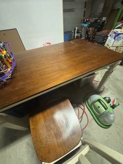 Table with chairs and bench