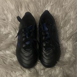 Kids Black and Blue adidas soccer cleats size 12.5 