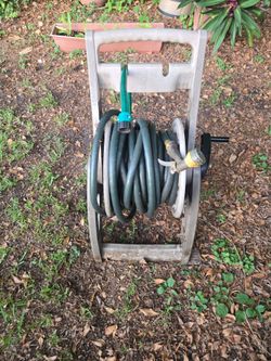 2 50ft hoses with reel n water connector