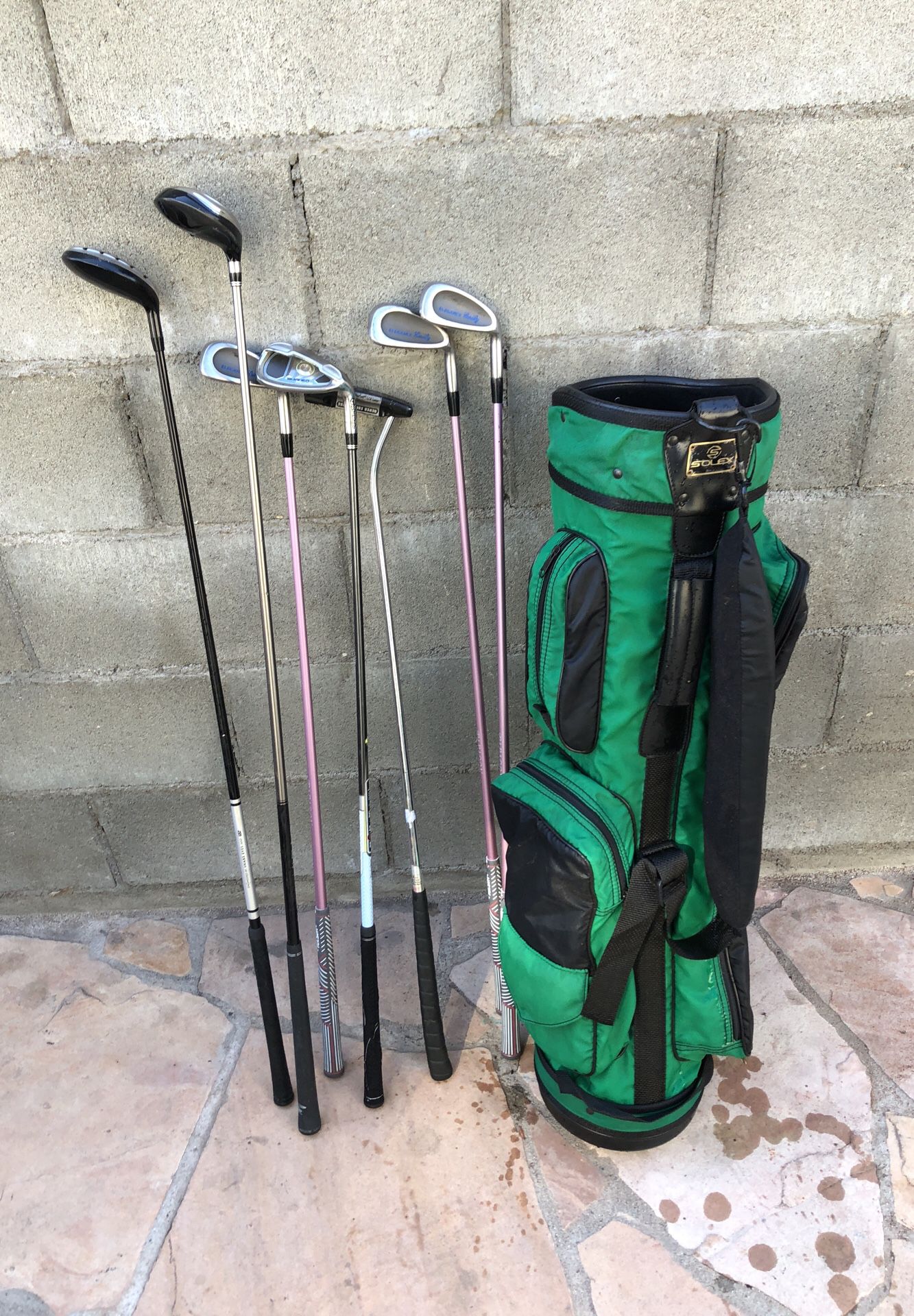 Bag and golf clubs