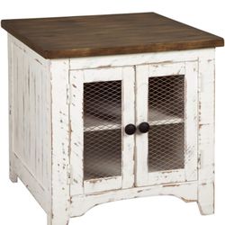 Worn white living room cabinet