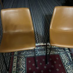 Two Beautiful Leather And Metal Chairs 