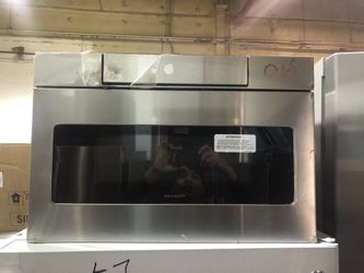 sharp microwave stainless 24 inches new dent