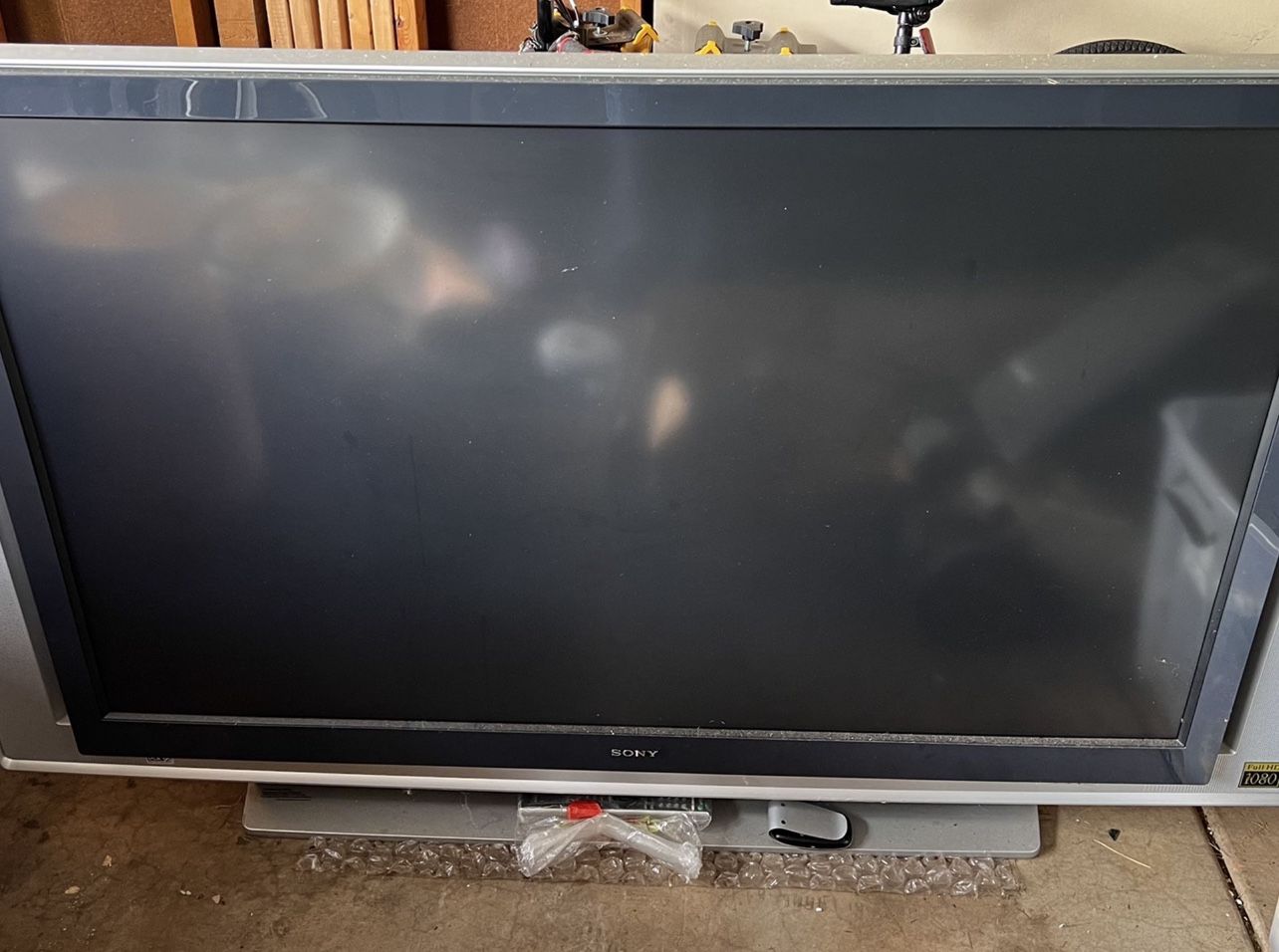 Sony KDS-R60XBR2 60-Inch SXRD Engine 1080p XBR LCD. 2-HDMI ports and others. Works great just old. Will help you load.