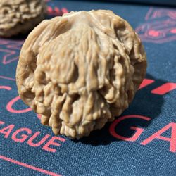 Wen plays with walnuts