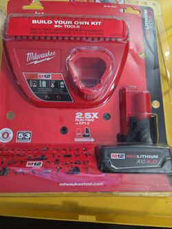 MILWAUKEE M12 BATTERIE 4.0AH AND CHARGER PRICE IS FIRM