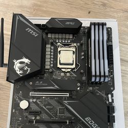 Motherboard, CPU, and RAM bundle.