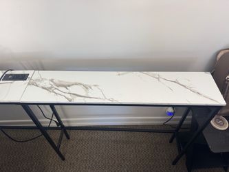 Behind sofa console table