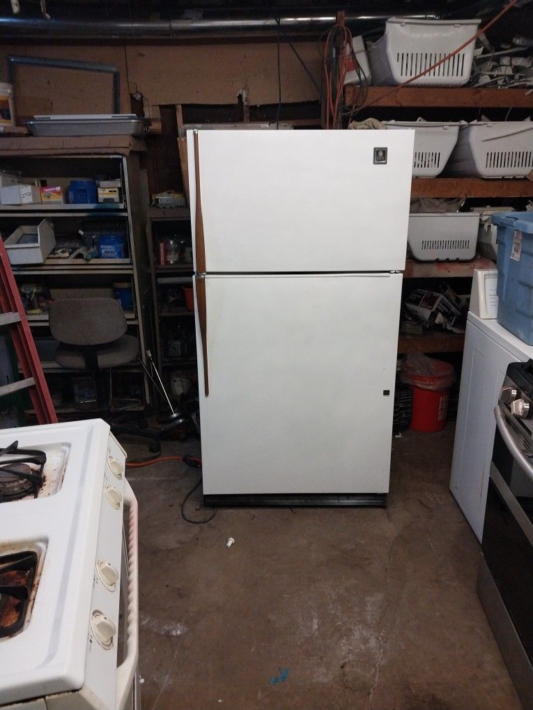 GE refrigerator. 33 wide. 64 tall, all working all there. for Sale in