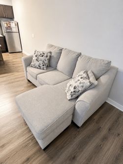 Gray Sectional Couch with Ottoman