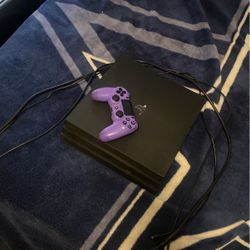 Ps4 Pro With A Controller And Cords 