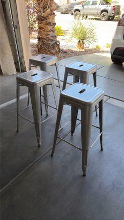 Set of four metal barstools
