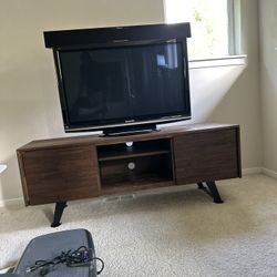 TV stand w/ TV and Sound bar