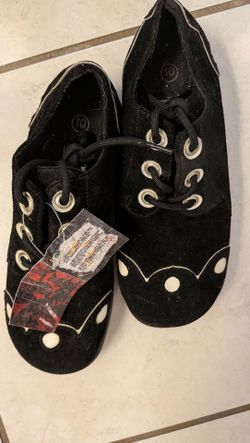 women's 10 new old stock from England not perfect look at photos suede. Black suede oxford-style shoes with cream contrast accents. Lace-up front with