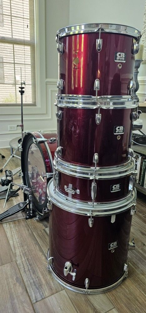 5 Piece drum kit with cymbals.