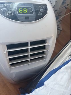 Portable ac blows cold