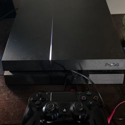 PS4 With Controller And Games