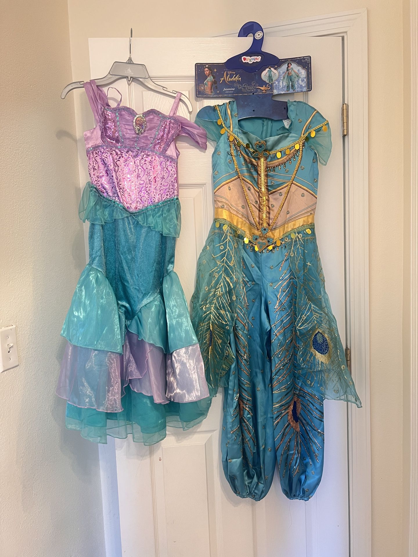 Princess jasmine, little mermaid, and wonder woman costumes