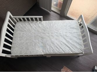 Toddler bed with crib mattress
