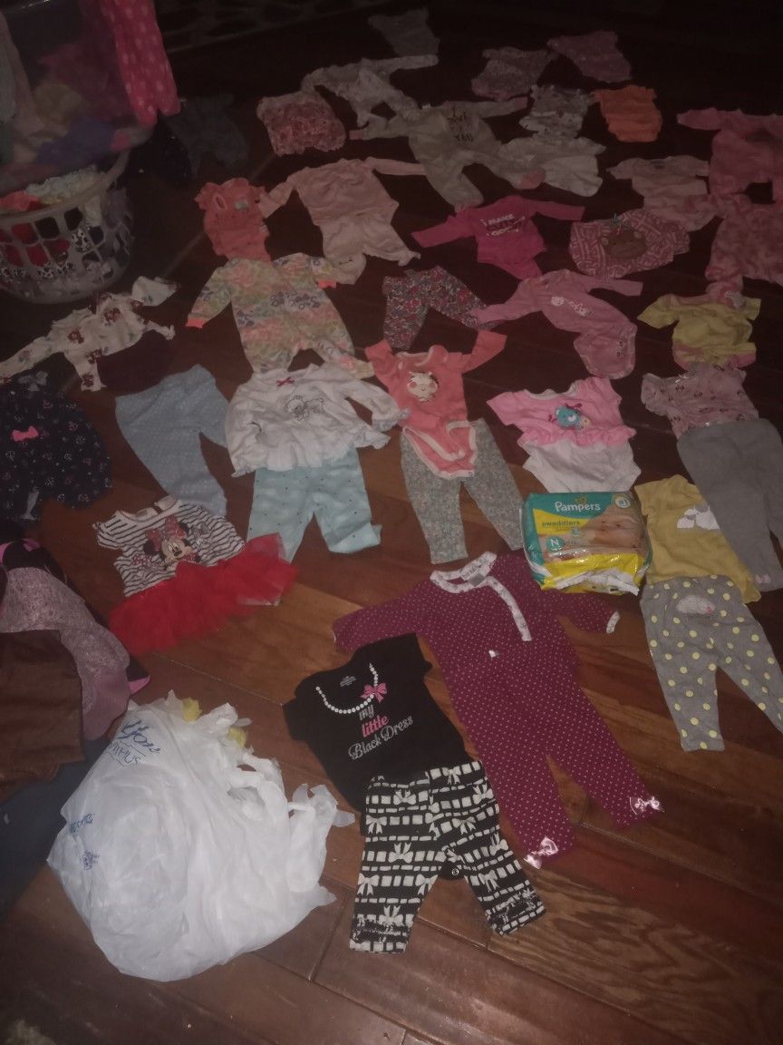 Baby Girl Clotheas Ewborn To 3 Months And A Unopened Pack Of Pampers