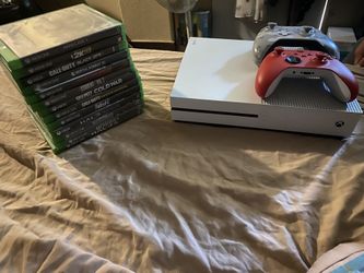 X Box1s For 200.00 W/remotes Games 5 .00 Each