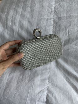 Silver clutch with tiny studded diamonds