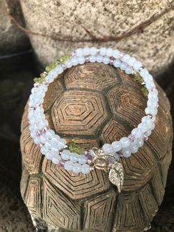 Moonstone peridot and crystal wrap bracelet with leaf charm