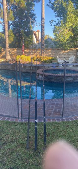 THREE PENN Saltwater Fishing Rods that are from 6'6"-8'0" and range from 15-50 lb range.