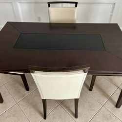 Dark wood dining room table