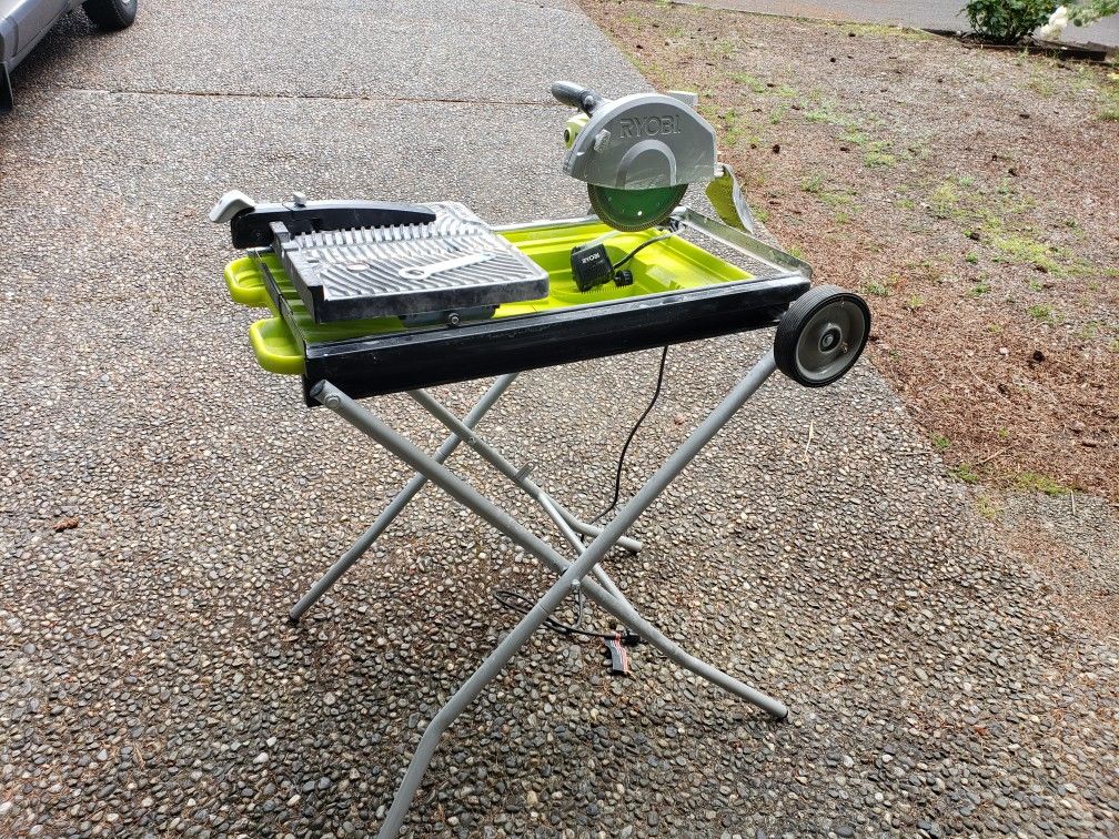 Ryobi 7-in Wet Sliding Table Tile Saw with Stand and Extra Blade.