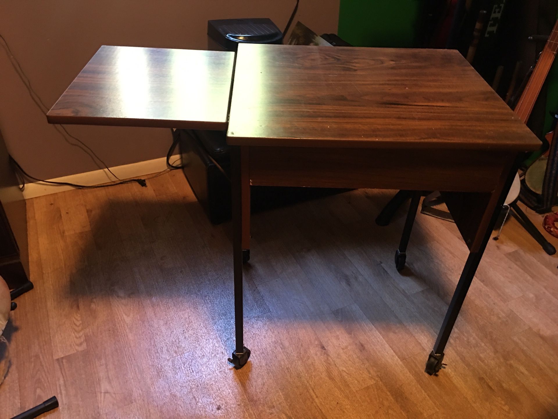 End table with top drawer, extension and 4 wheels on bottom
