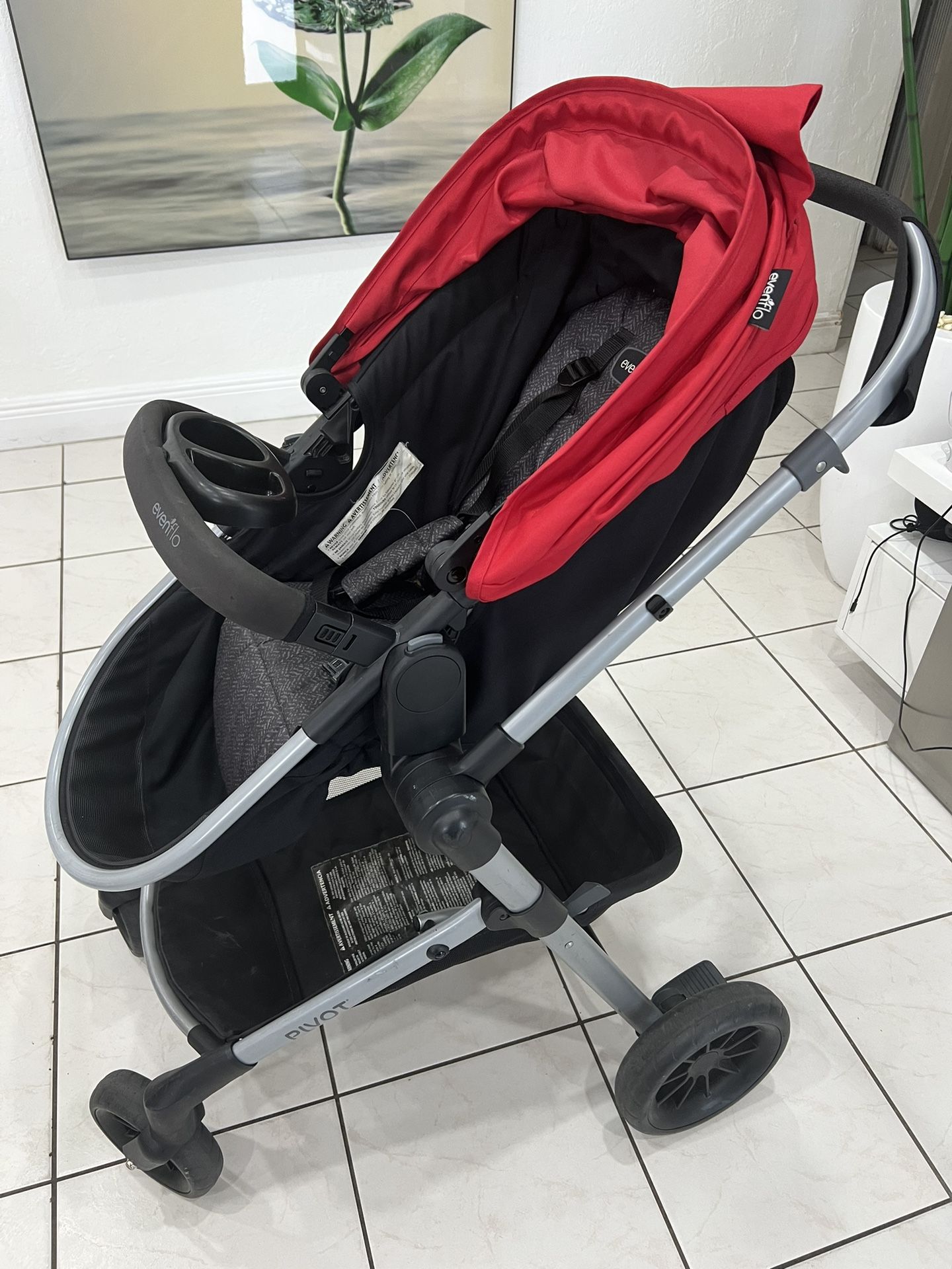 Coche Evenflo Sistema de viaje modular Pivot con asiento de automóvil infantil LiteMax