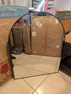 Arched wall mirror