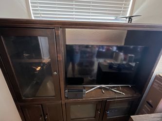 Solid wood entertainment center $
