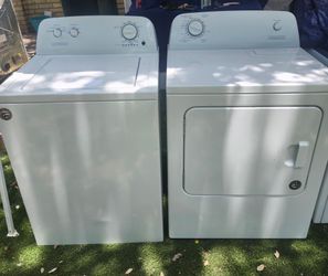 CONSERVATOR washer and dryer is electric works well 30 days warranty