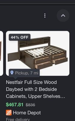 Brown full size day bed with a dresser