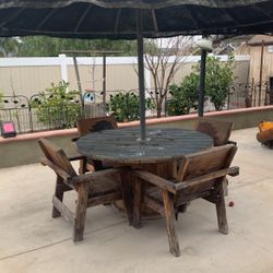 Table With 4 Chairs And a Roof Cover