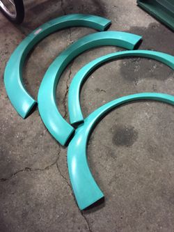 Fiberglass wheel wells I do not know what car these fit.