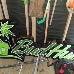 Cracked Bud Hut Sign