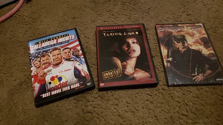 Movies for cheap. DVDS. Talladega Nights / Omega Cop / Taking Lives